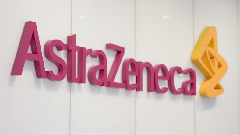 AstraZeneca company logo displayed on an interior office wall
