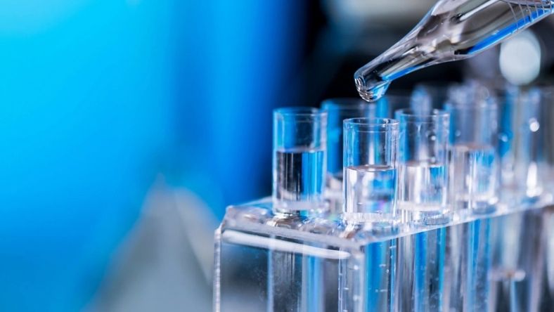 Laboratory test tubes filled with liquid during scientific analysis